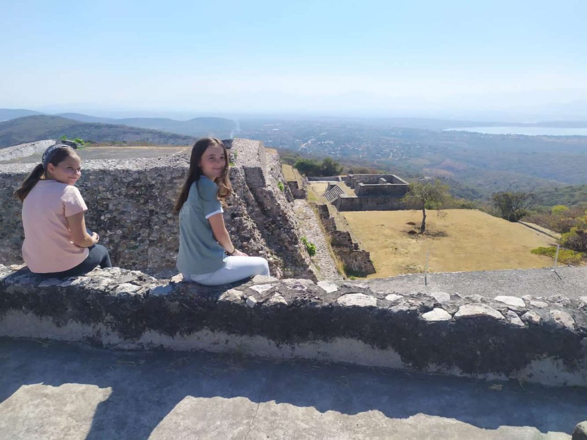Alexia Pena-Mendoza (LP ‘24, right) and her sister Ana (LP ‘26, left) at the ages of 15 and 13, respectively, overlooking the pyramis in Xochilcaco, Morelos in Mexico. 