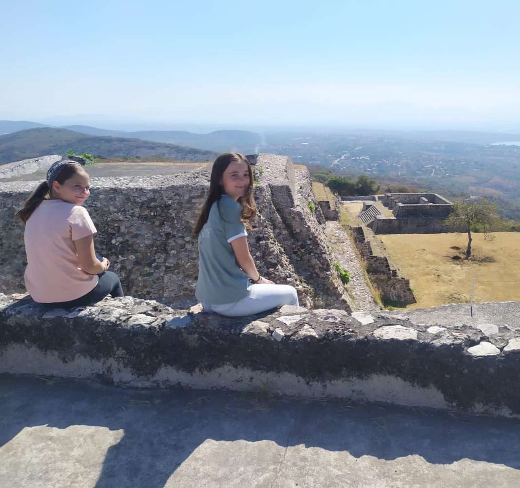 Alexia Pena-Mendoza (LP ‘24, right) and her sister Ana (LP ‘26, left) at the ages of 15 and 13, respectively, overlooking the pyramis in Xochilcaco, Morelos in Mexico. 