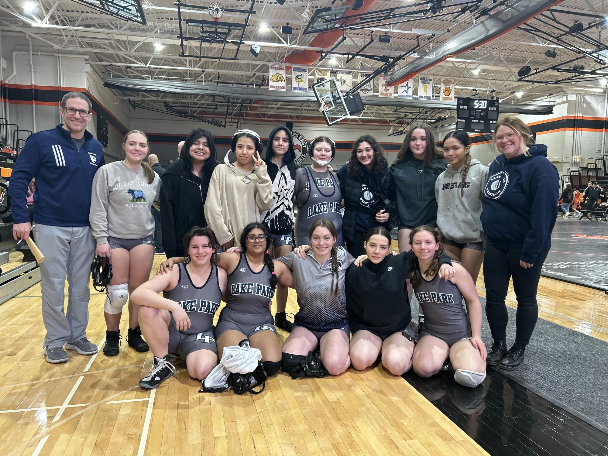 The girl’s wrestling team gathers for a photo from their winter 2023-24 season.