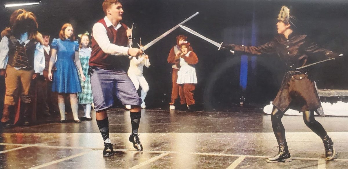 Peter (left) and Fenris Ulf (right) duke it out as Aslan’s followers tensely watch in LP Theater’s recent performance of The Chronicles of Narnia.