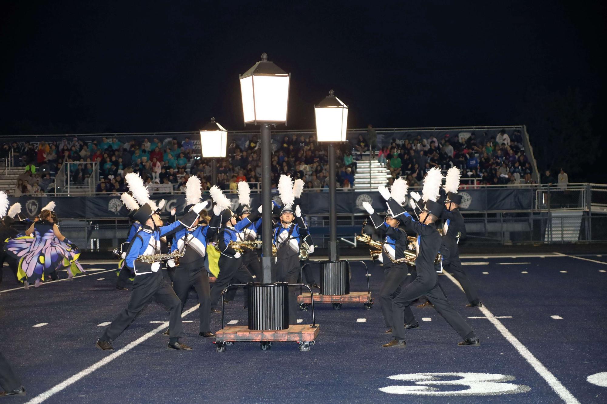 The Lake Park Marching Band performs their show, 'To the Light,' as a showcase to conclude the Lancer Joust, a festival and competition for area marching bands.
