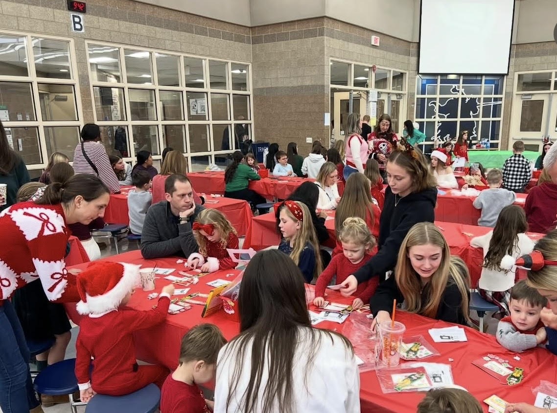 Students, staff, and community members gather for activities and craft at Student Council’s annual December Breakfast with Santa event. 
Photo courtesy Emilia Kaleta via Instagram
